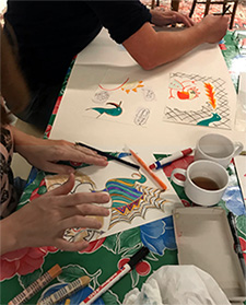 deelnemers workshop aan het tekenen