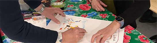 deelnemers workshop aan het tekenen